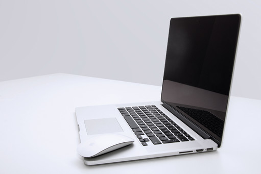 Apple Macbook on the white desk