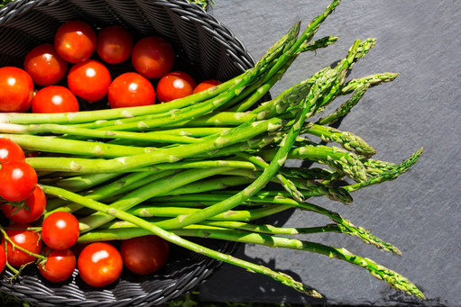 Asparagus and Tomatoes in a Basket